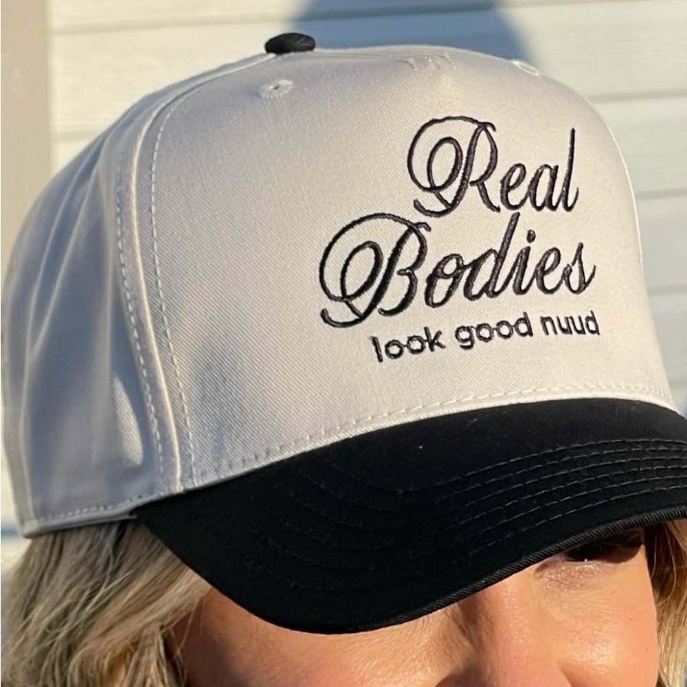 nuuds Real Bodies Look Good Nuud Cream and Black Hat